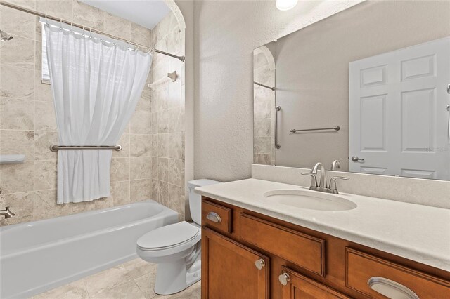 full bathroom with tile patterned flooring, vanity, shower / bath combination with curtain, and toilet