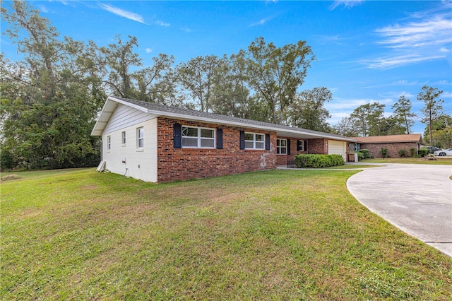 ranch-style home with a front lawn