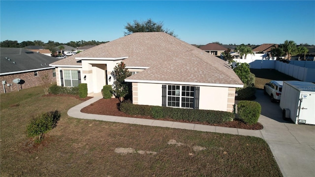 view of front facade with a front lawn