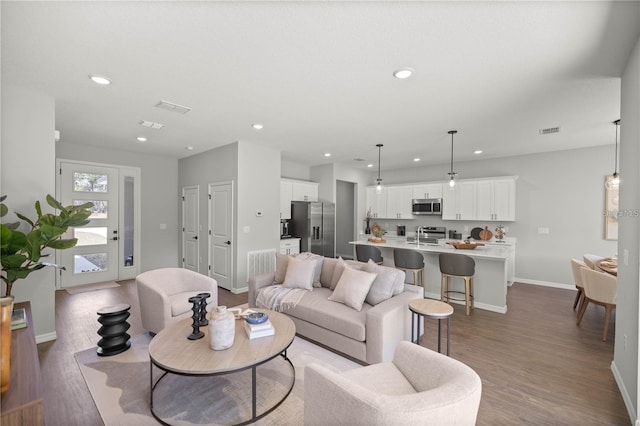 living room with wood-type flooring