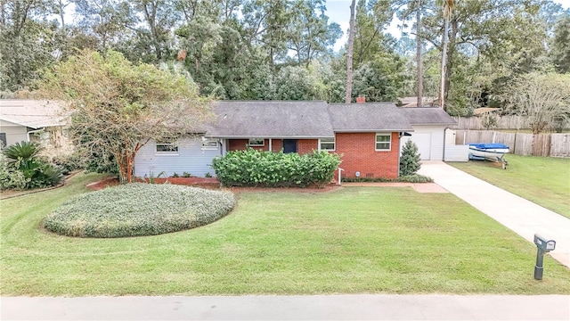 ranch-style house with a garage and a front yard