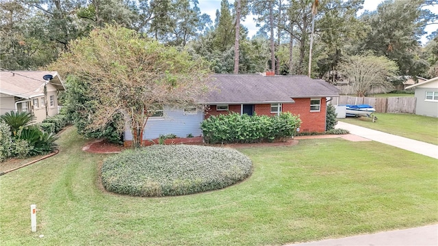 ranch-style house with a front yard