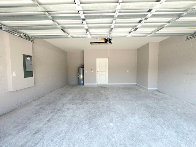 garage featuring a garage door opener, electric panel, and electric water heater