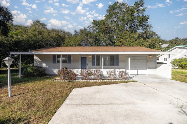 ranch-style home with covered porch, a front yard, and a garage