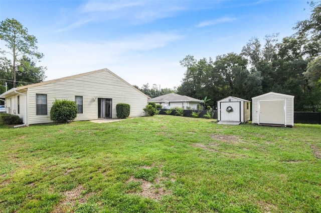 view of yard with a storage shed