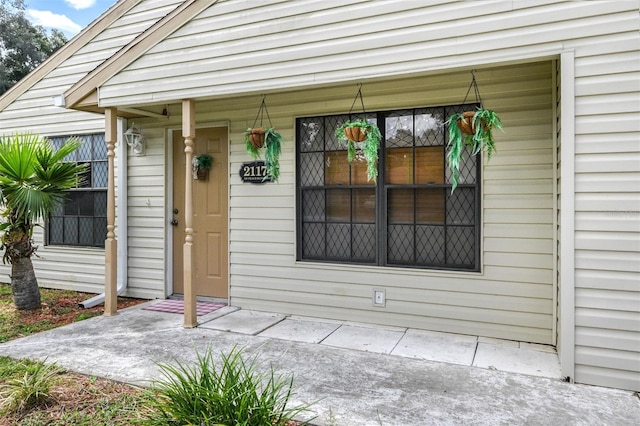 property entrance with a porch