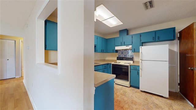 kitchen with blue cabinetry, decorative backsplash, white appliances, and light hardwood / wood-style floors