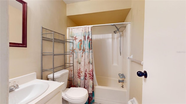 full bathroom featuring shower / tub combo, vanity, and toilet