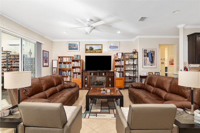 living room featuring ceiling fan, light tile patterned floors, and crown molding