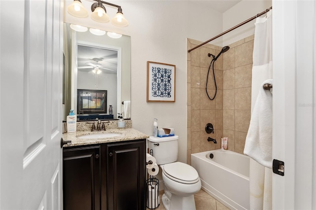 full bathroom with shower / tub combo, vanity, ceiling fan, tile patterned flooring, and toilet