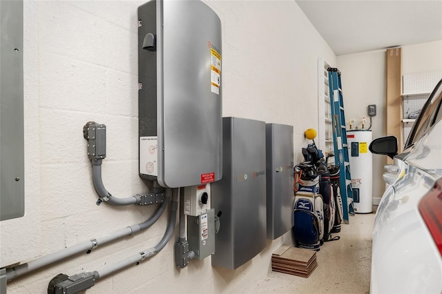 utility room featuring water heater