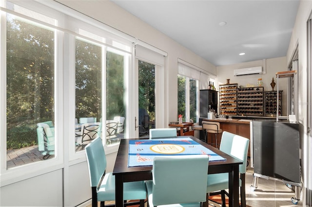 dining space featuring a wall unit AC