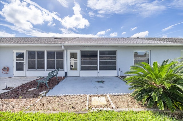 back of property featuring a patio area