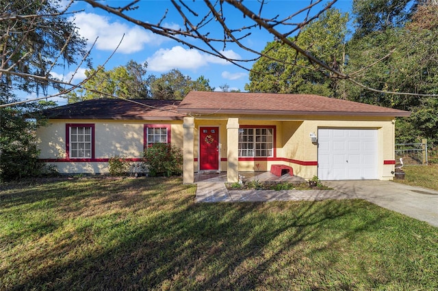 ranch-style home with a garage and a front lawn