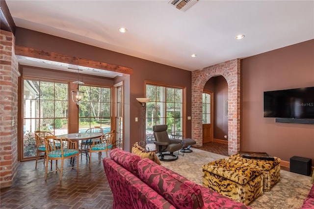 living room featuring plenty of natural light