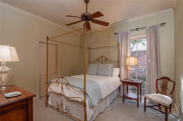 bedroom featuring light carpet, ceiling fan, and crown molding