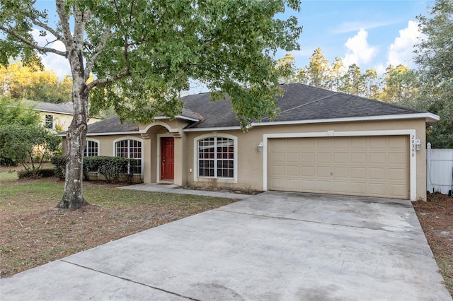 ranch-style home with a garage