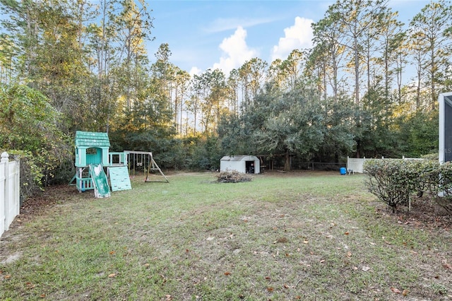 20390 SW 57th St, Dunnellon, FL 34431 - view of yard with a playground and view of scattered trees
