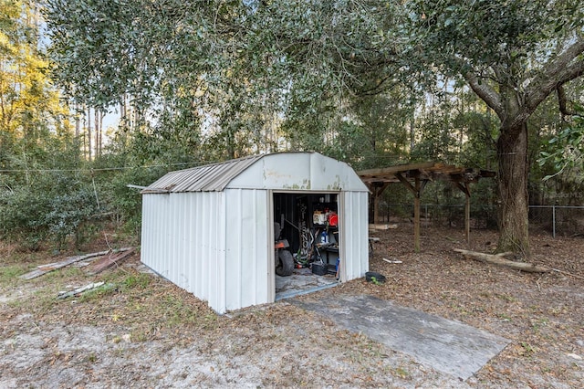 20390 SW 57th St, Dunnellon, FL 34431 - view of shed with view of scattered trees