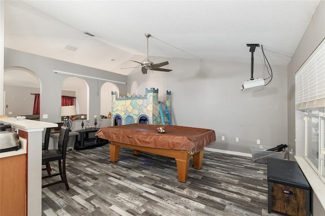 rec room with ceiling fan, dark hardwood / wood-style flooring, vaulted ceiling, and pool table