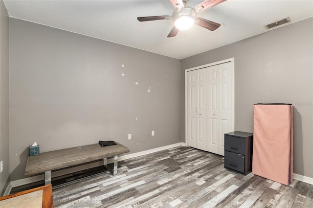 20390 SW 57th St, Dunnellon, FL 34431 - unfurnished office with wood finished floors, baseboards, and ceiling fan