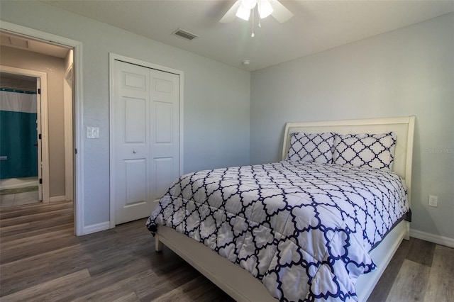 17023 SW 41st Avenue Rd, Ocala, FL 34473 - bedroom with ceiling fan, a closet, and dark hardwood / wood-style floors