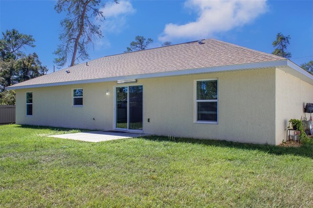 17023 SW 41st Avenue Rd, Ocala, FL 34473 - back of property featuring a yard