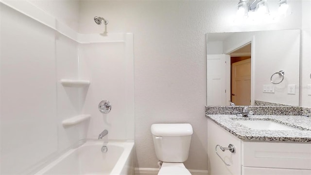 full bathroom featuring shower / washtub combination, vanity, and toilet