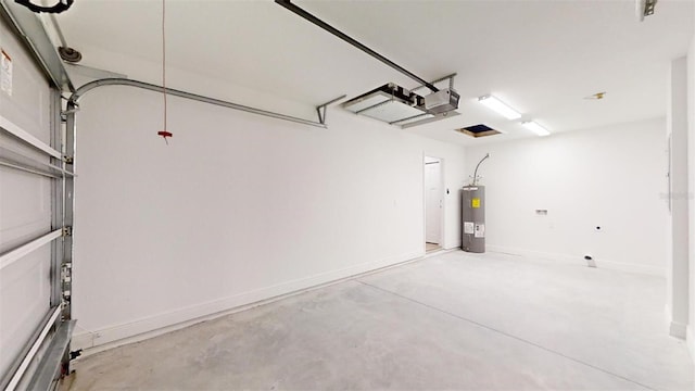 garage with electric water heater and a garage door opener