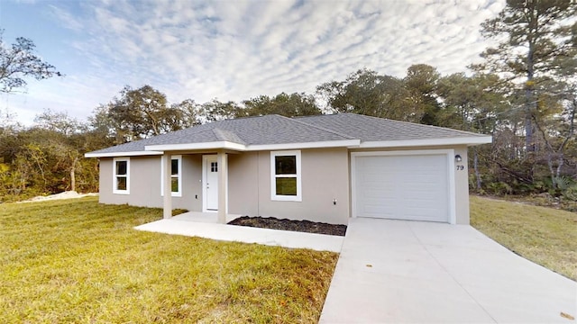 single story home featuring a front yard and a garage