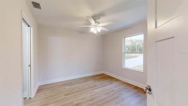 unfurnished room featuring ceiling fan and light hardwood / wood-style floors