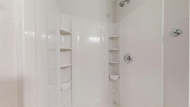 bathroom featuring walk in shower