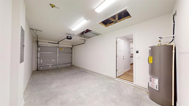 garage with electric water heater and a garage door opener