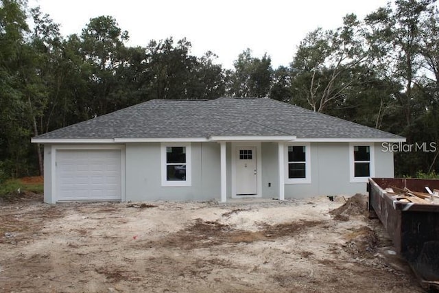 single story home with a garage