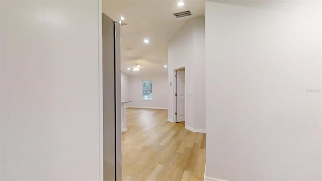 corridor featuring light hardwood / wood-style floors