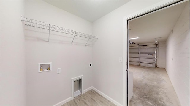 washroom featuring electric dryer hookup and washer hookup