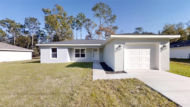 ranch-style house with a garage and a front yard