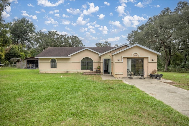 ranch-style house with a front lawn