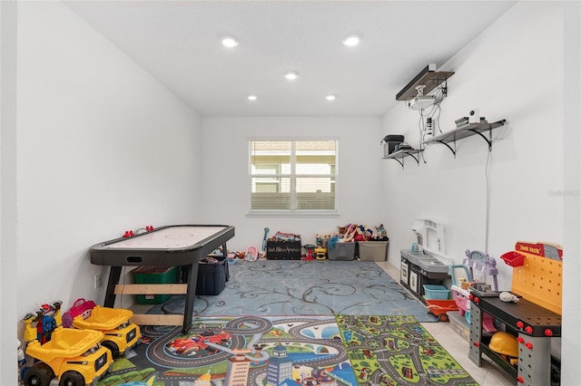 recreation room featuring light tile patterned floors