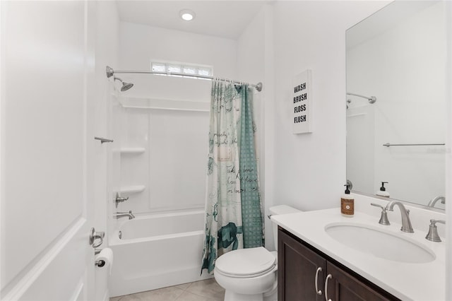 full bathroom with toilet, tile patterned floors, vanity, and shower / tub combo with curtain