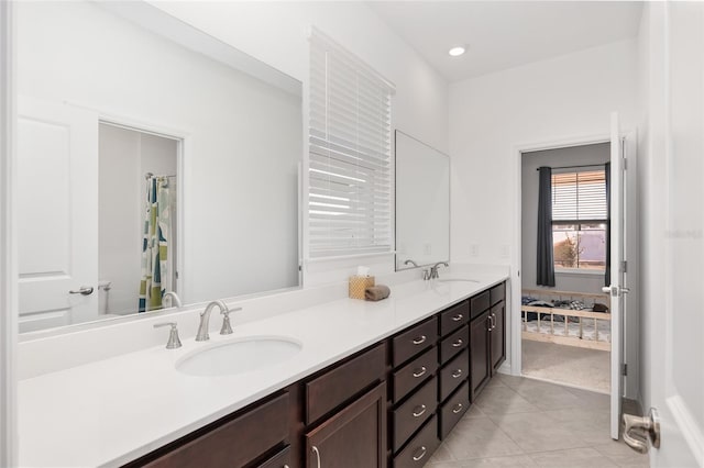 bathroom featuring vanity and tile patterned flooring