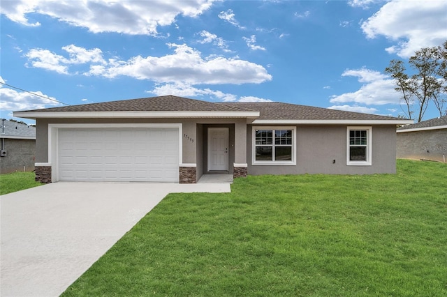 view of front of property featuring an attached garage, concrete driveway, stone siding, stucco siding, and a front lawn