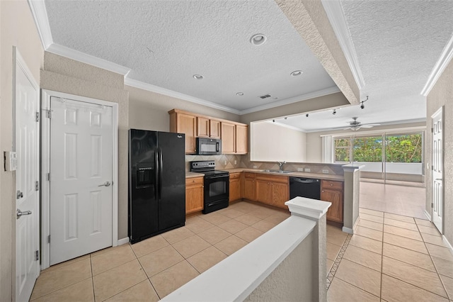 kitchen featuring ceiling fan, kitchen peninsula, crown molding, light tile patterned floors, and black appliances