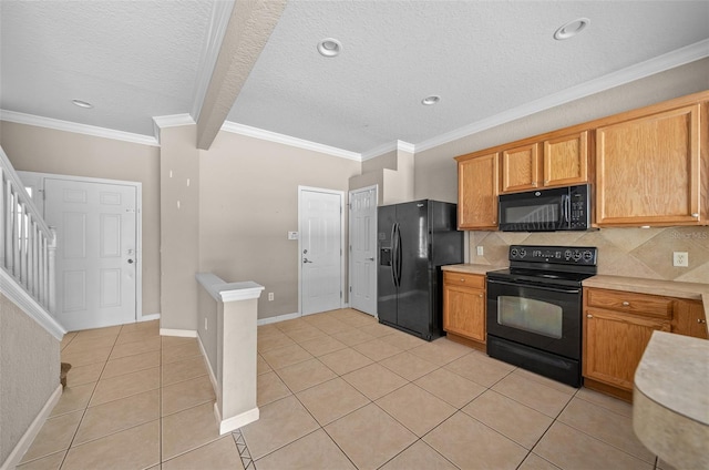 kitchen with black appliances, light tile patterned flooring, ornamental molding, and backsplash