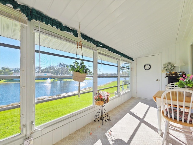 sunroom with a water view