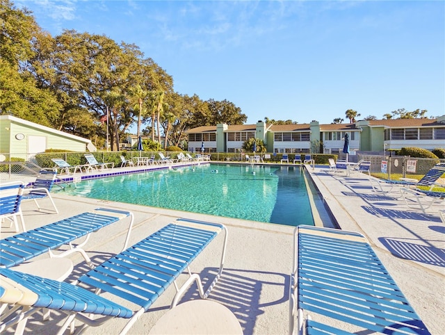 view of pool featuring a patio