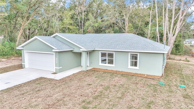 single story home featuring a garage