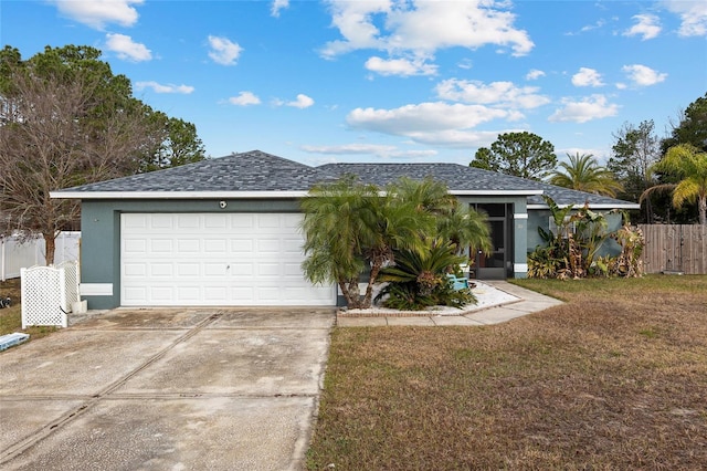 ranch-style house with a front lawn and a garage