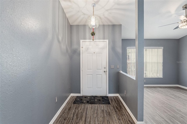 doorway to outside featuring ceiling fan and hardwood / wood-style flooring