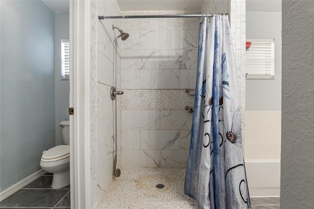 bathroom with toilet, tile patterned flooring, and a shower with shower curtain